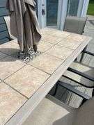 Tile Top Patio Dining Set with 6 Chairs and Umbrella