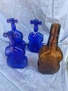 Collection of Violin Shaped Glass Bottles