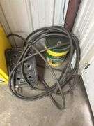 Justrite Flammable Liquid Storage Cabinet with Assorted Fluids and Supplies