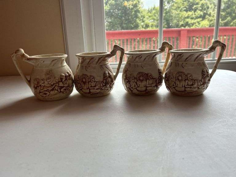 Set of Four "Shelah '84" Relief Design Pitchers image