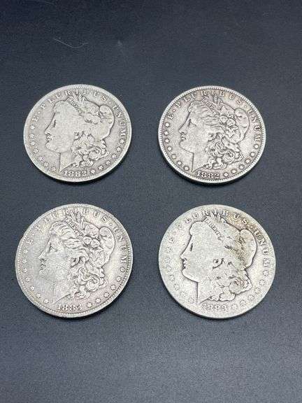 FOUR MORGAN SILVER DOLLARS