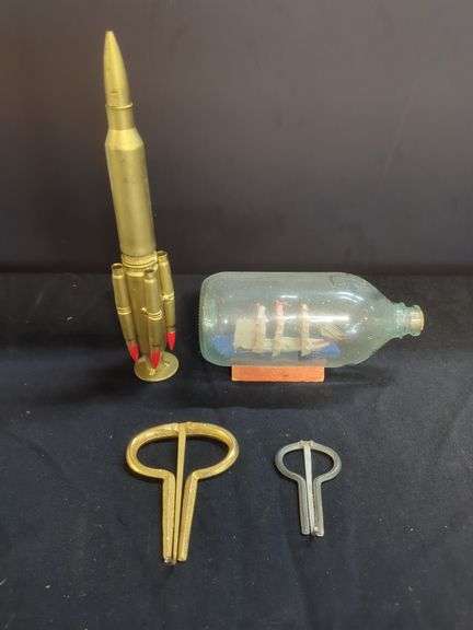Bullet Casing Figurine, Ship in Bottle, & Musical Instruments