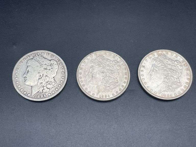 THREE MORGAN SILVER DOLLARS
