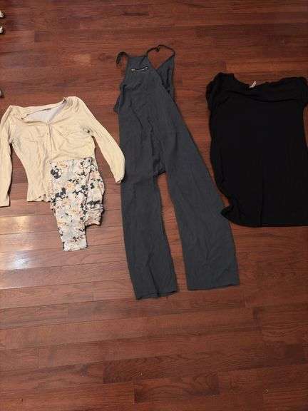 FOUR PIECES OF FEMALE CLOTHING image