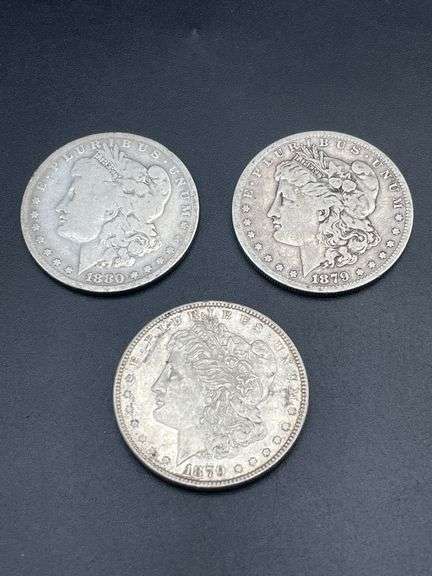 THREE MORGAN SILVER DOLLARS