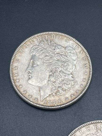 THREE MORGAN SILVER DOLLARS