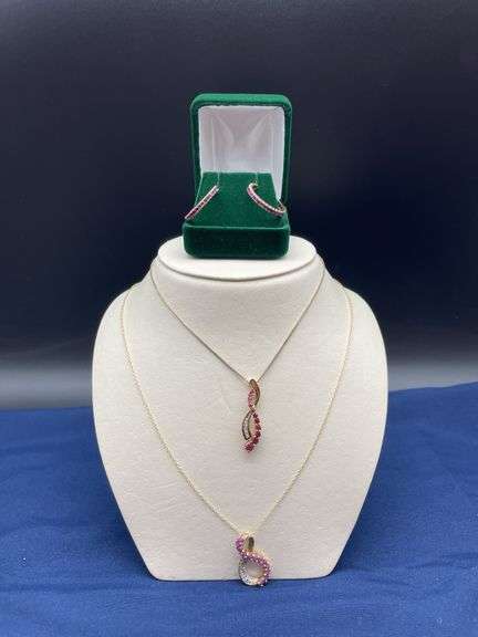 Two Gold Tone Necklaces and Hoop Earrings with Pink Stones image