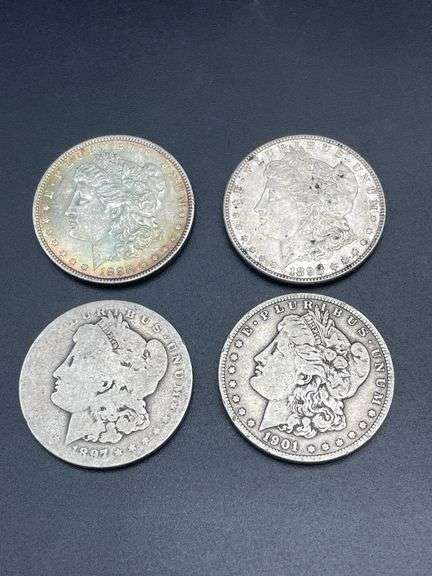 FOUR MORGAN SILVER DOLLARS
