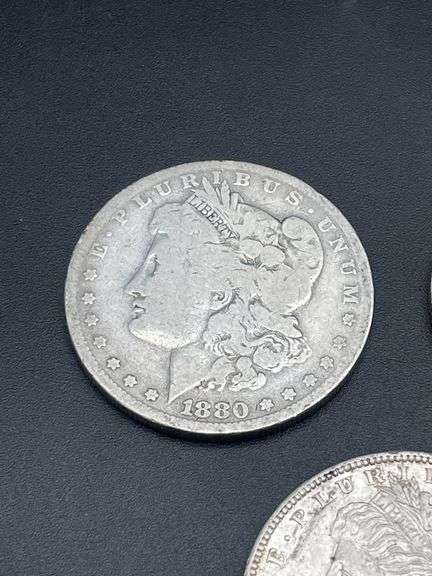 THREE MORGAN SILVER DOLLARS