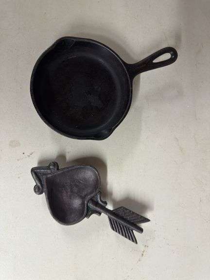Cast Iron Skillet and Heart-Shaped Arrow Dish image