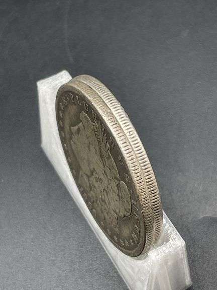 TWO MORGAN SILVER DOLLARS