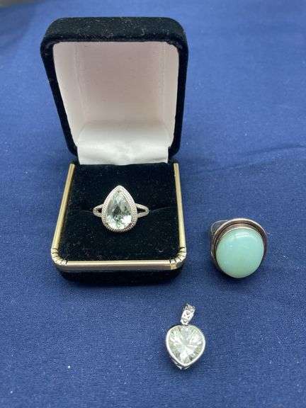 Silver Tone Rings and Pendant with Faceted Stones image