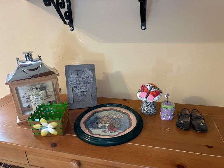 Assorted Home Decor Items: Lantern, Framed Art, Planter, Figurines, and Shoes image