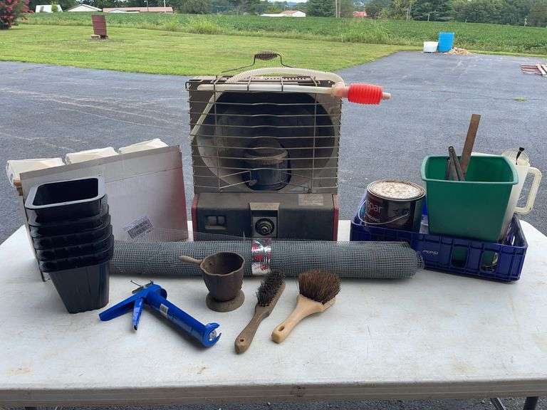 Heater, Brushes, Chicken Wire, and Various Tools and Supplies image