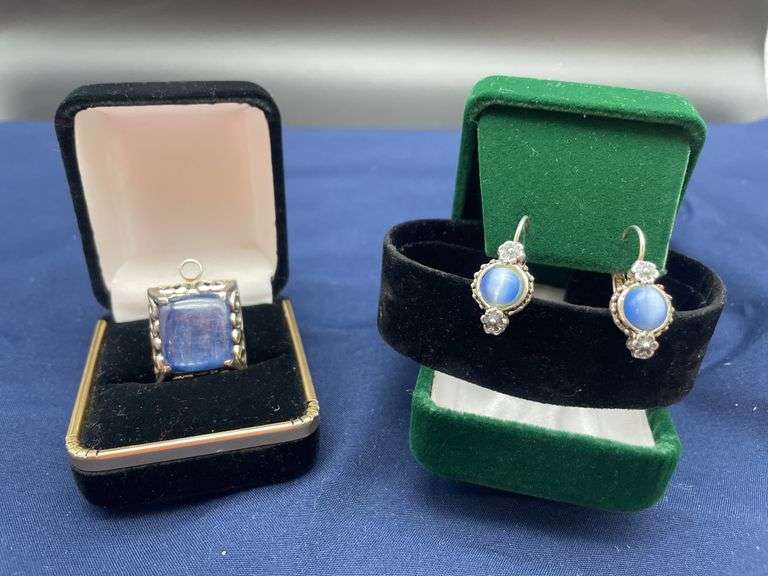 Sterling Silver Pendant and Earrings with Blue Stones image