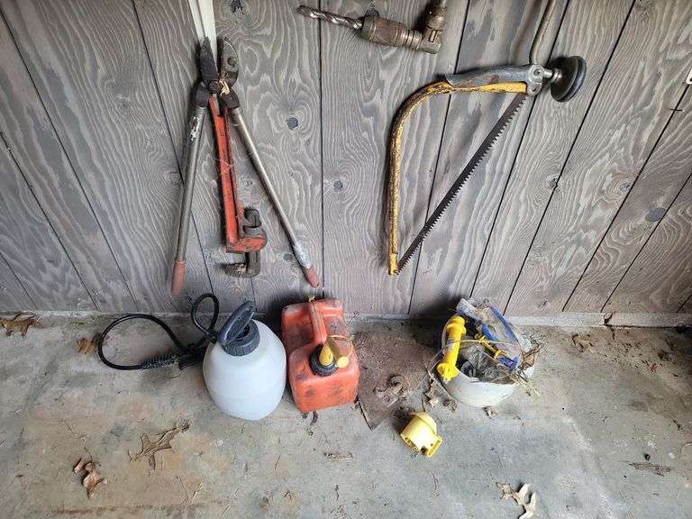Mixed Lot of Tools - Pipe Wrench, Bow Saw, Sprayer, and More image