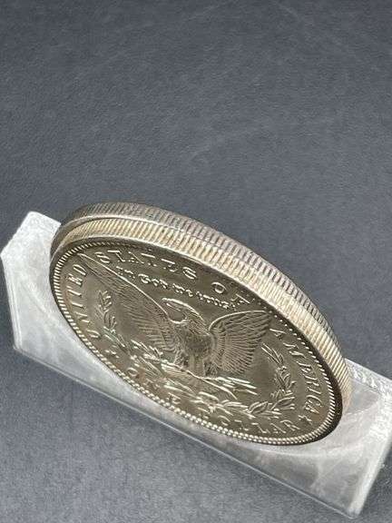 TWO MORGAN SILVER DOLLARS