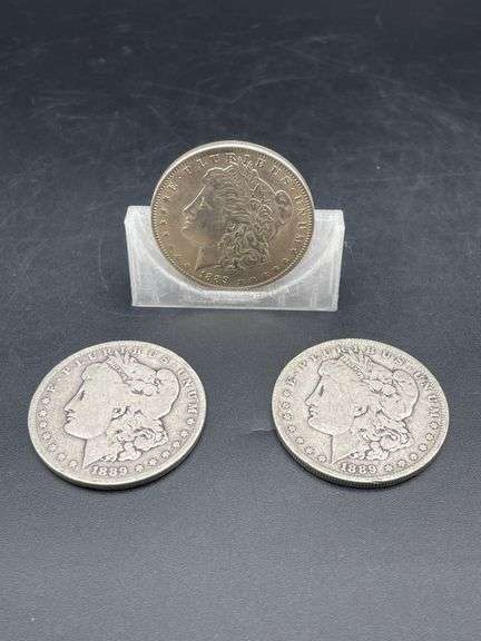 THREE MORGAN SILVER DOLLARS