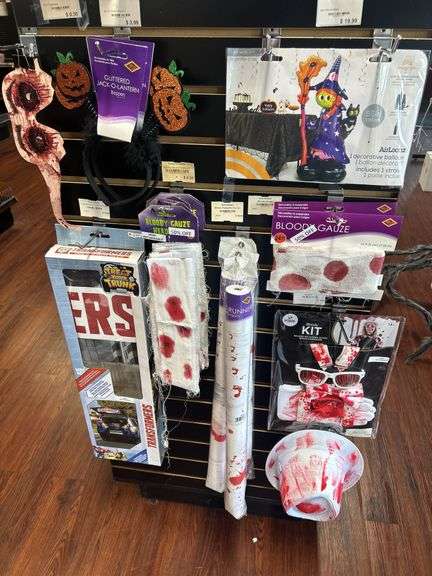 Halloween Decoration Assortment: Bloody Gauze, Transformer Trunk Decor, Witch Balloon, and More image