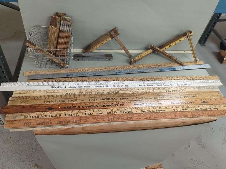 Assorted Collection of Advertising Rulers and Folding Wooden Gauges image
