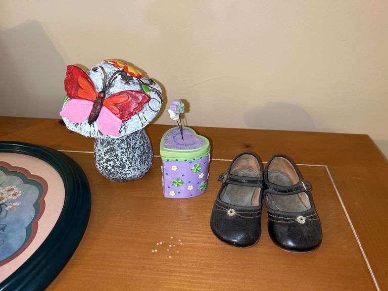 Assorted Home Decor Items: Lantern, Framed Art, Planter, Figurines, and Shoes