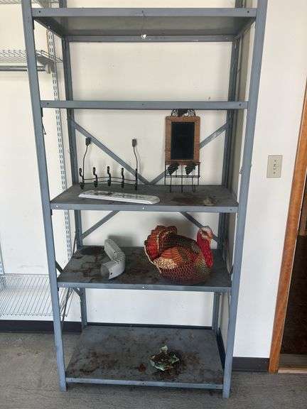 Metal Shelving Unit with Assorted Items image