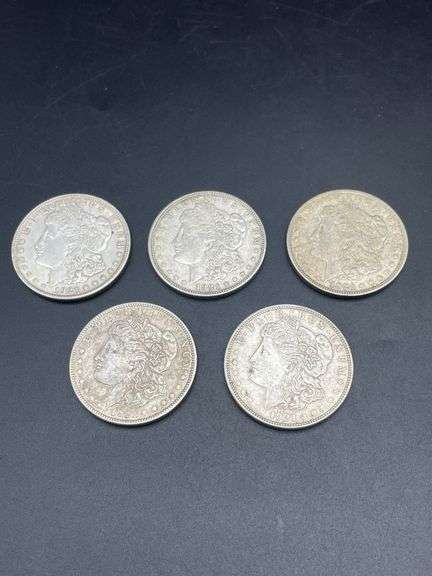 FIVE MORGAN SILVER DOLLARS
