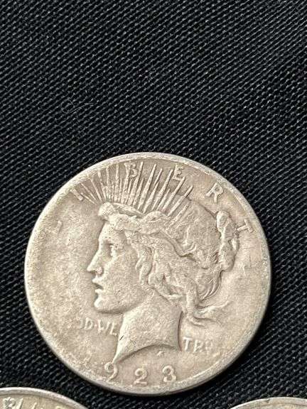 Three 1923 US Peace Silver Dollars