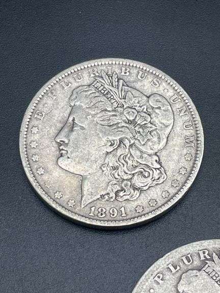 THREE MORGAN SILVER DOLLARS