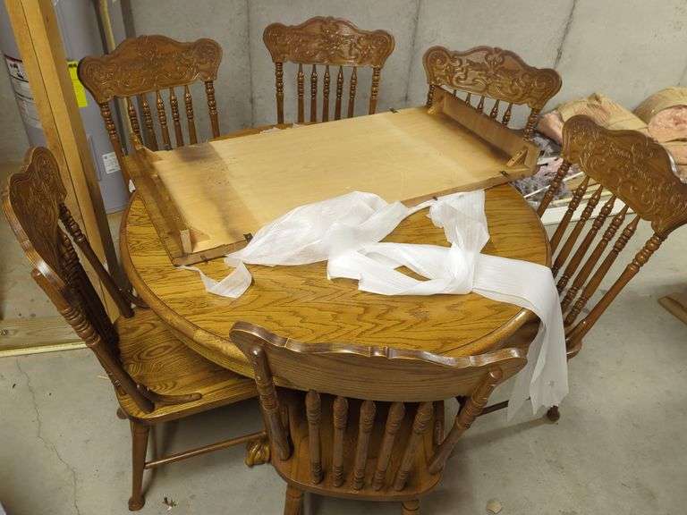 Extendable Round Wood Dining Table with Six Chairs