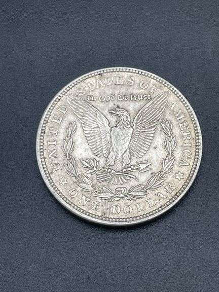 FIVE MORGAN SILVER DOLLARS