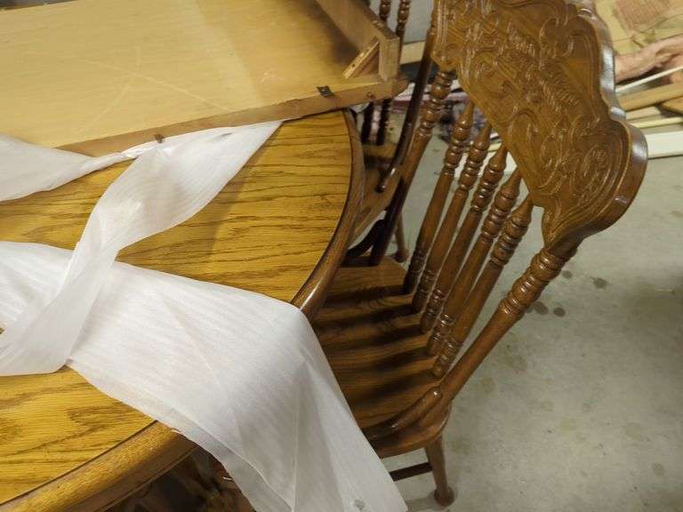 Extendable Round Wood Dining Table with Six Chairs