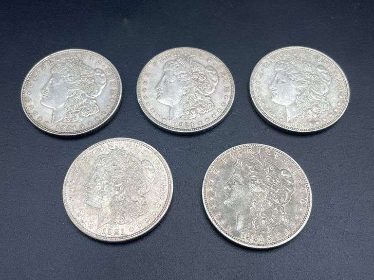 FIVE MORGAN SILVER DOLLARS