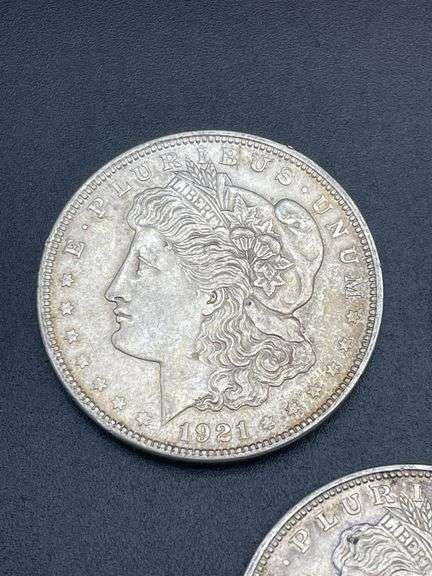 THREE MORGAN SILVER DOLLARS