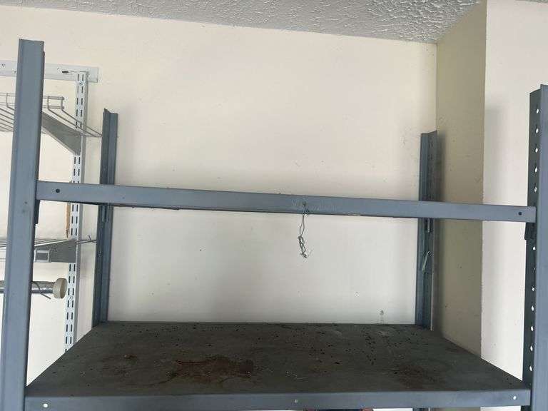 Metal Shelving Unit with Assorted Items