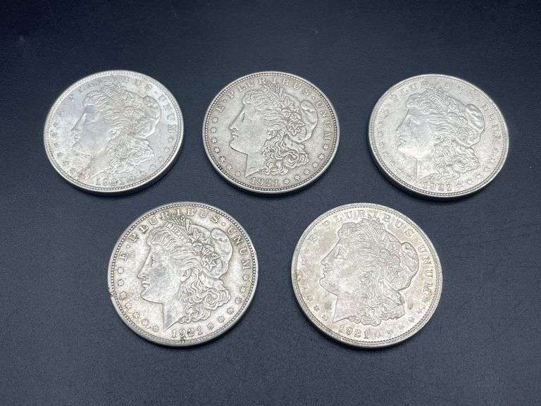 FIVE MORGAN SILVER DOLLARS
