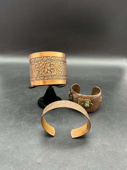 Group of Three Copper Bracelets image