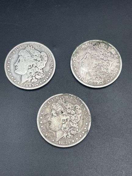 THREE MORGAN SILVER DOLLARS