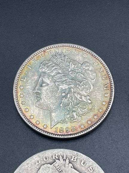 FOUR MORGAN SILVER DOLLARS