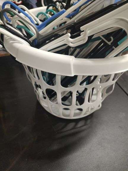 CLOTHES HANGERS AND LAUNDRY BASKET