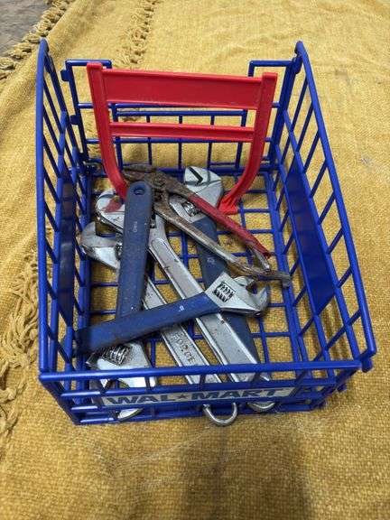 BASKET OF ADJUSTABLE WRENCHES image
