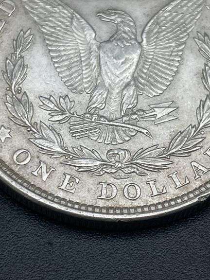 FIVE MORGAN SILVER DOLLARS