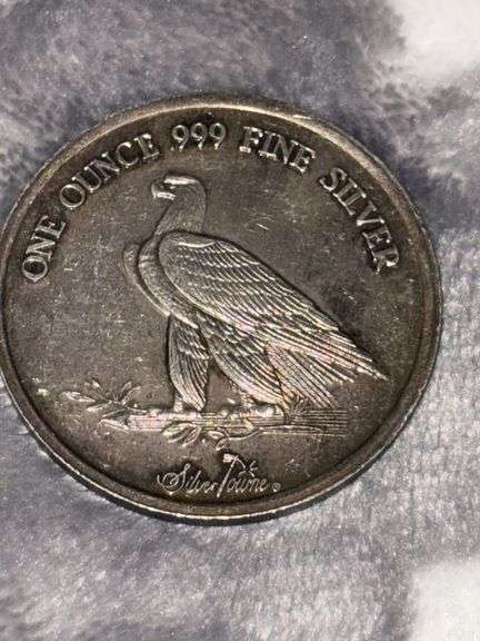 1 OUNCE .999 FINE SILVER SILVER TOWNE NO DATE LOCATED (DOES NOT STICK TO MAGNET)