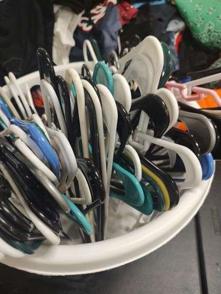 CLOTHES HANGERS AND LAUNDRY BASKET