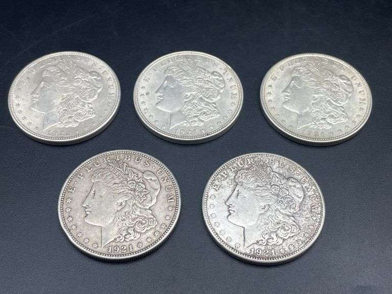FIVE MORGAN SILVER DOLLARS