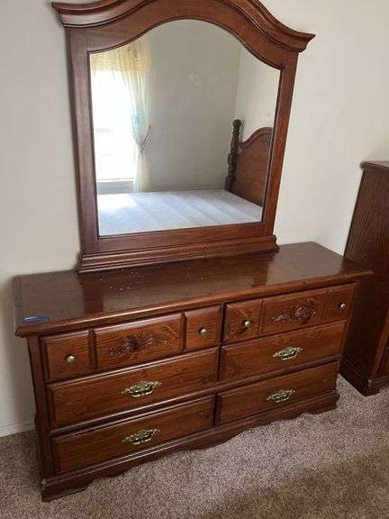 Four Piece Bedroom Set - Dresser with Mirror, Chest, and Nightstand image