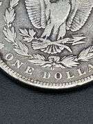 THREE MORGAN SILVER DOLLARS