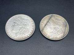 TWO MORGAN SILVER DOLLARS