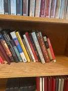 Book Shelf and Collection of John MacArthur 'Grace to You' Books, Commentaries, and Media