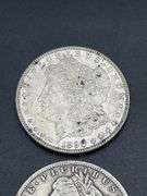 FOUR MORGAN SILVER DOLLARS
